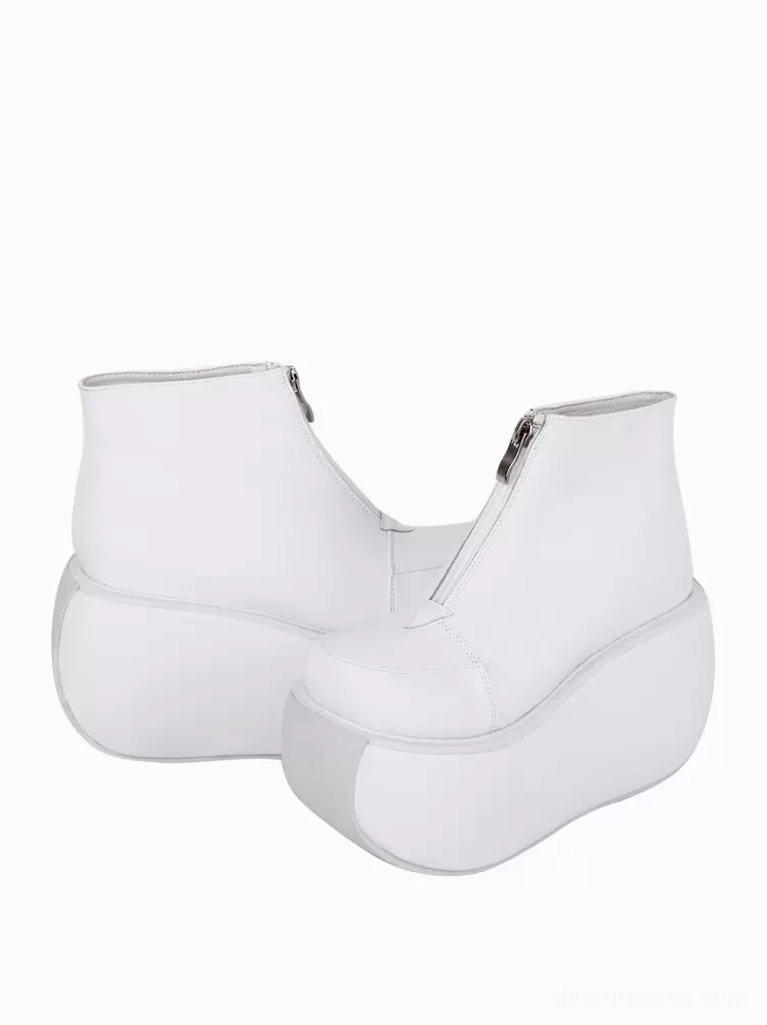 white platform lolita ankle boots elevated front view silver zippers asymmetrical placement thick wedge soles gothic aesthetic
