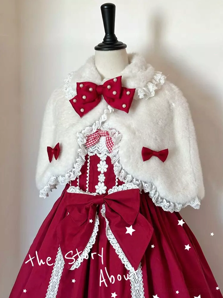 White plush bunny ear lolita cape with pearl-studded red bow and small red accent bows, layered over red lolita dress on mannequin