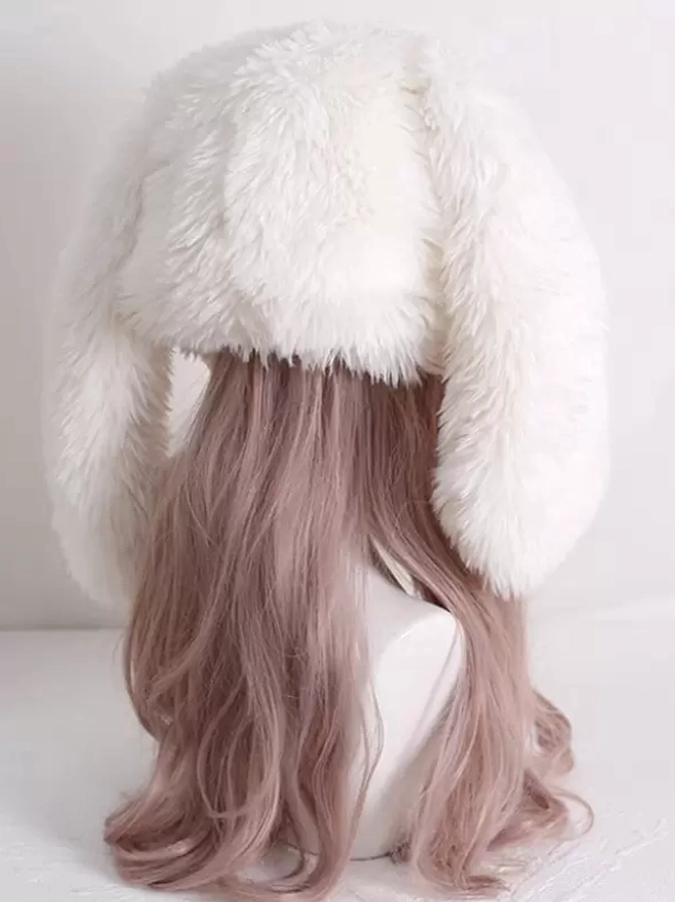 Back view of fluffy white rabbit ear lolita hat showing rear plush ear texture, soft fleece finish, and full fur trim scarf on light brown wigged mannequin