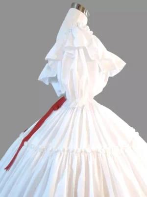 White rococo lolita formal dress back three-quarter view displaying ruffled off-shoulder top long red waist sash coordinating pleated tiered skirt silhouette