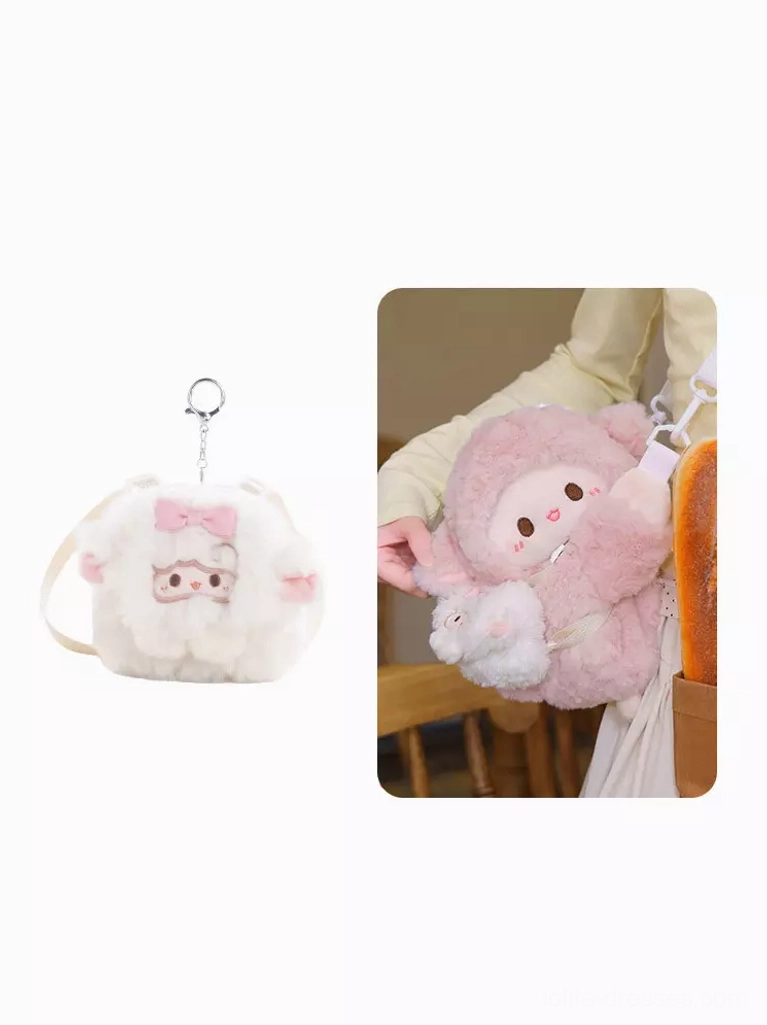White sheep plush crossbody lolita bag with pink bow detail close-up wear view with matching mini keychain