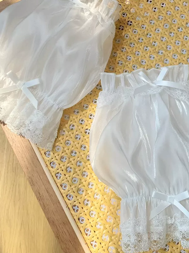 Pure white sheer organza puff oversleeves with delicate lace trims and coordinating white satin bows