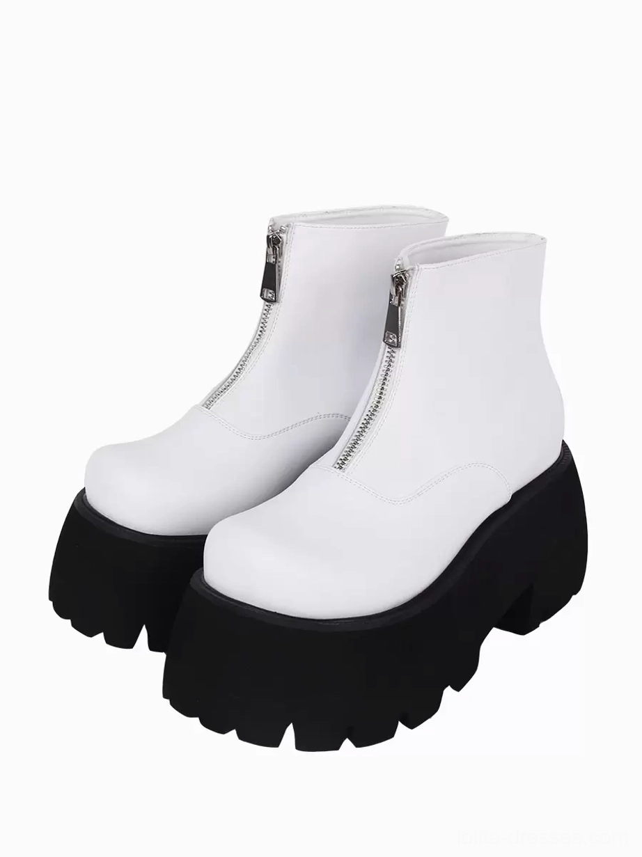 White platform ankle boots with silver metal front zippers black lug soles front three-quarter view gothic steampunk lolita footwear