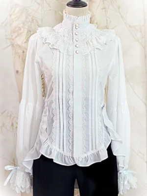 White steampunk ouji lolita blouse front view with lace-trimmed stand collar pleated lace front panel tie-on cuffs and ruffled hem on vintage mannequin