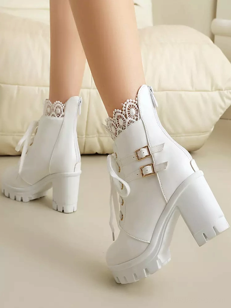 White Sweet Lolita ankle boots oblique side worn feet view with white PU leather double buckles and white lace collar