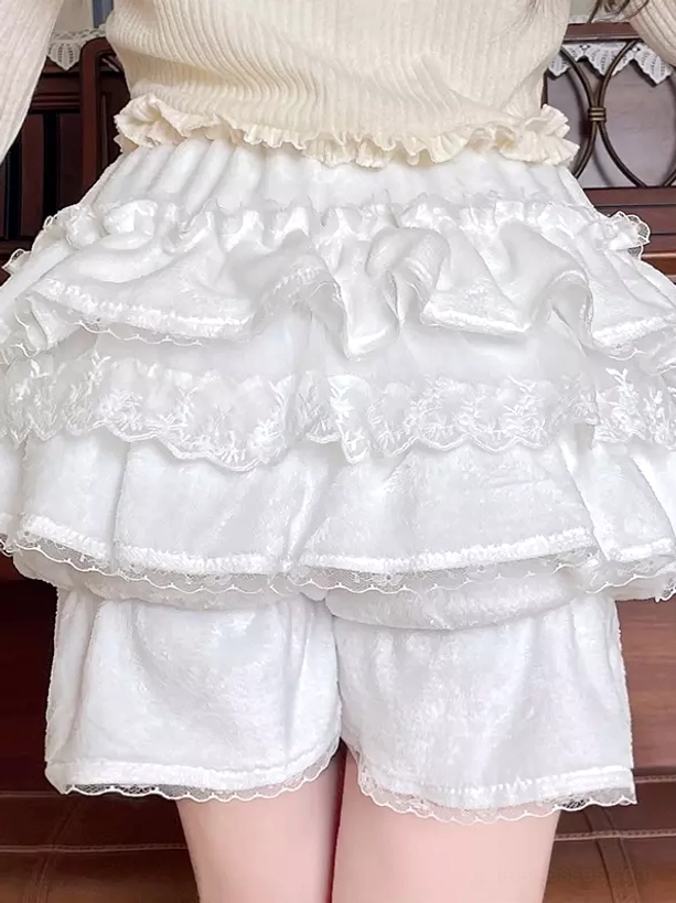 White Sweet Lolita bloomers flat front close-up displaying double-layer lace ruffles, premium velvet fabric, and decorative hem bow embellishment