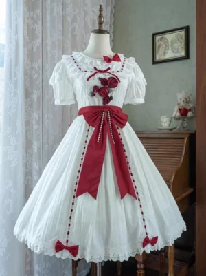 White sweet lolita dress with red roses and puff sleeves front view, vintage rococo style dress with ruffled collar and dimensional rose embellishment