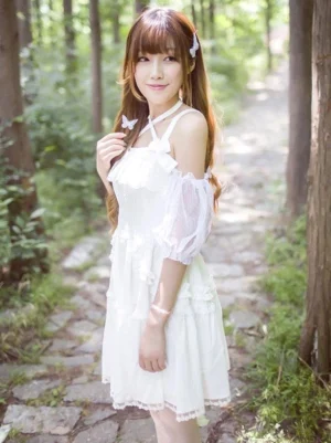 white lolita jumper dress with short puff sleeves ruffled collar and A-line chiffon skirt eye-level front view