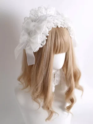 White Sweet Lolita headdress with ruffled lace and dual satin bows, left oblique angle view on mannequin with curly blonde wig, showing side ribbon details and lace trim craftsmanship