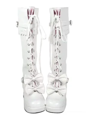 White sweet lolita mid-calf platform boots with dual bow decorations front lace-up closure and scalloped trim professional flat lay view