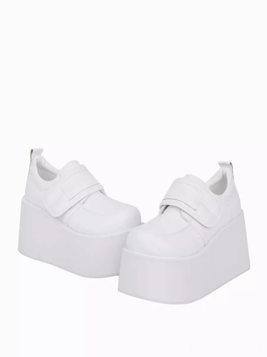 White sweet lolita platform pumps side oblique angle showcasing smooth matte PU leather finish hook-and-loop fastener secure ankle strap
