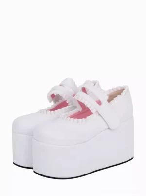 White sweet lolita platform wedge shoes with ruffled collar trim and velcro ankle strap, front paired three-quarter view showcasing pink inner lining and bow details