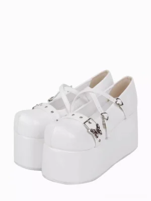 white sweet lolita platform pumps front three-quarter view with criss-cross straps and butterfly buckle hardware on plain white background