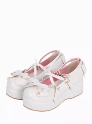 White sweet lolita wedge heel pumps with oversized lace bow front three-quarter pair view glossy PU leather star charms