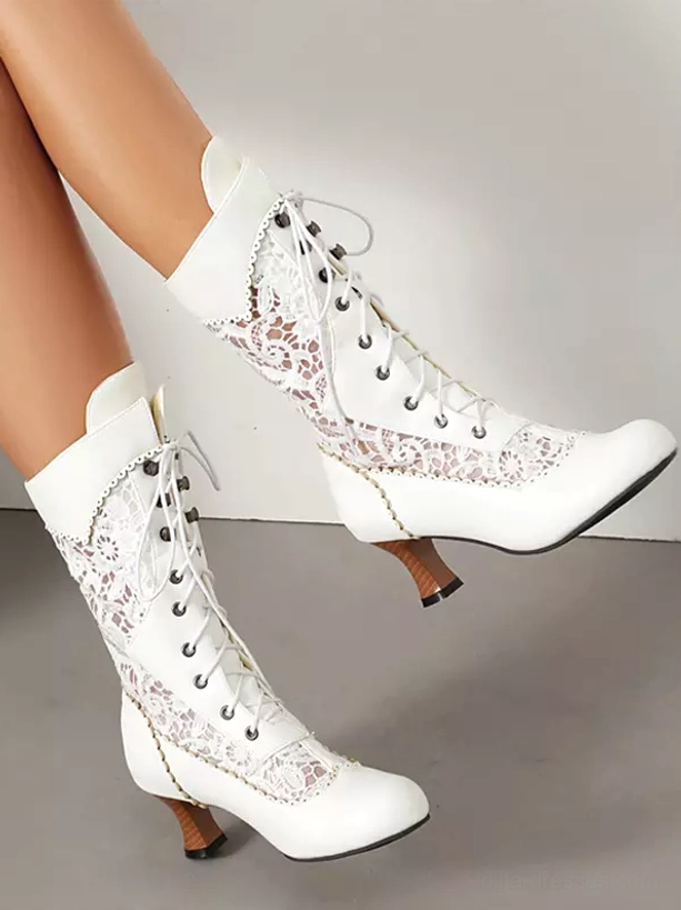 white lolita mid-calf boots dynamic lifted leg perspective showing floral lace inserts front lace-up