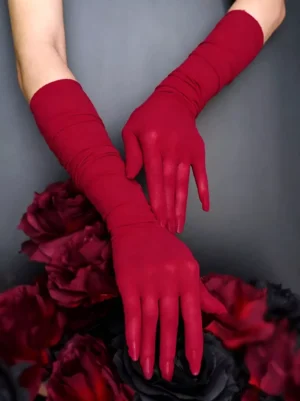 Wine red burgundy long evening gloves overhead view rose flower background gothic lolita matte sheer fabric ruched sleeves